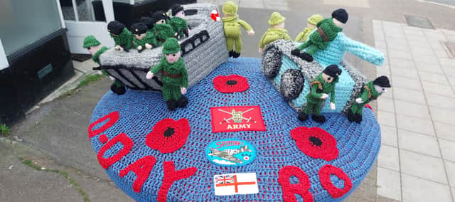 Baffins Yarn-Bombers have put out their latest post box topper creation - a D-Day 80 commemoration