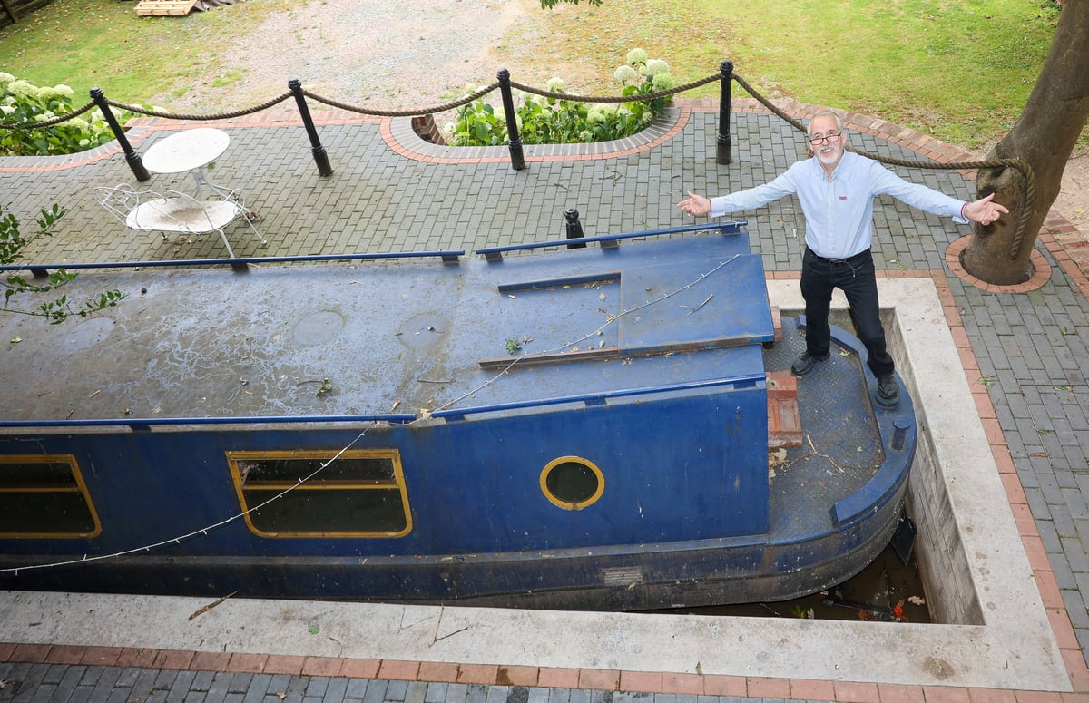 I spent £30k building the ‘world's shortest canal’ in my garden - with my boat able to travel just 24 inches