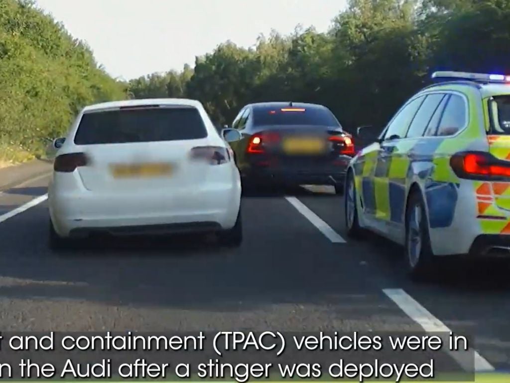 Dramatic footage shows reckless Audi driver get boxed in by police