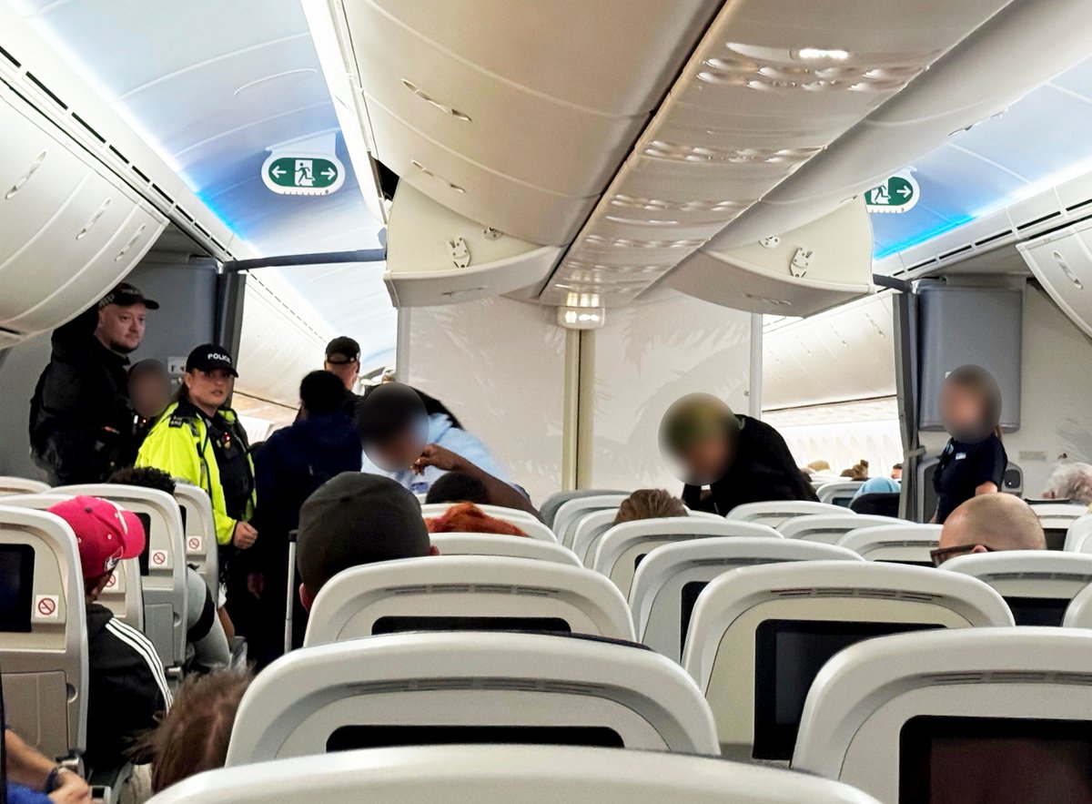 Mid-air “tequila terror”: Dramatic video shows moment ‘drunk and unruly’ passengers argue on plane