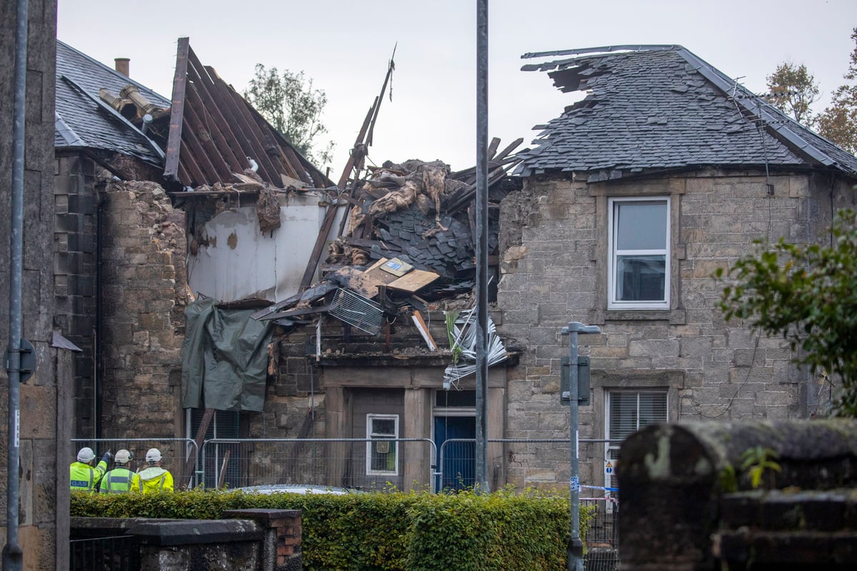 Man dies and three others hospitalised after explosion at block of flats