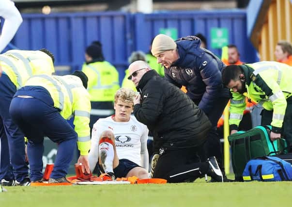 Luton midfielder Cameron McGeehan suffered a broken leg at Fratton Park on Monday    Picture: Joe Pepler